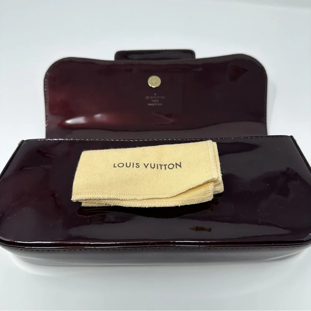 Louis Vuitton Dark Burgundy Clutch with Gold Logo